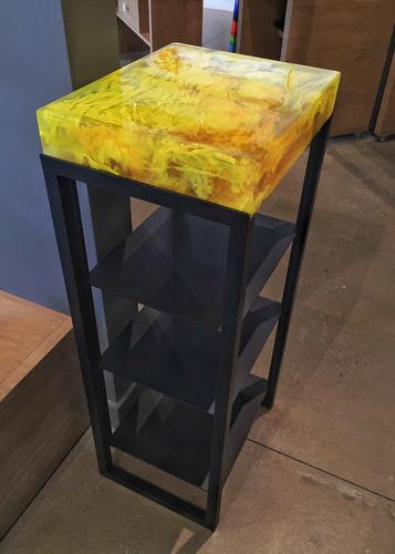 Cast glass magazine stand by Heather Cuell