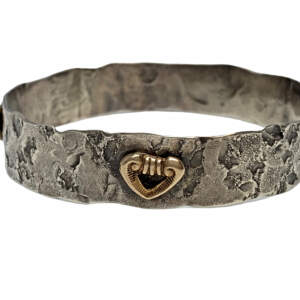 Handmade sterling silver and bronze heart bangle by Karyn Chopik | Effusion Art Gallery + Cast Glass Studio, Invermere BC