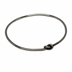 Handmade sterling silver love knot bangle by Karyn Chopik | Effusion Art Gallery + Cast Glass Studio, Invermere BC