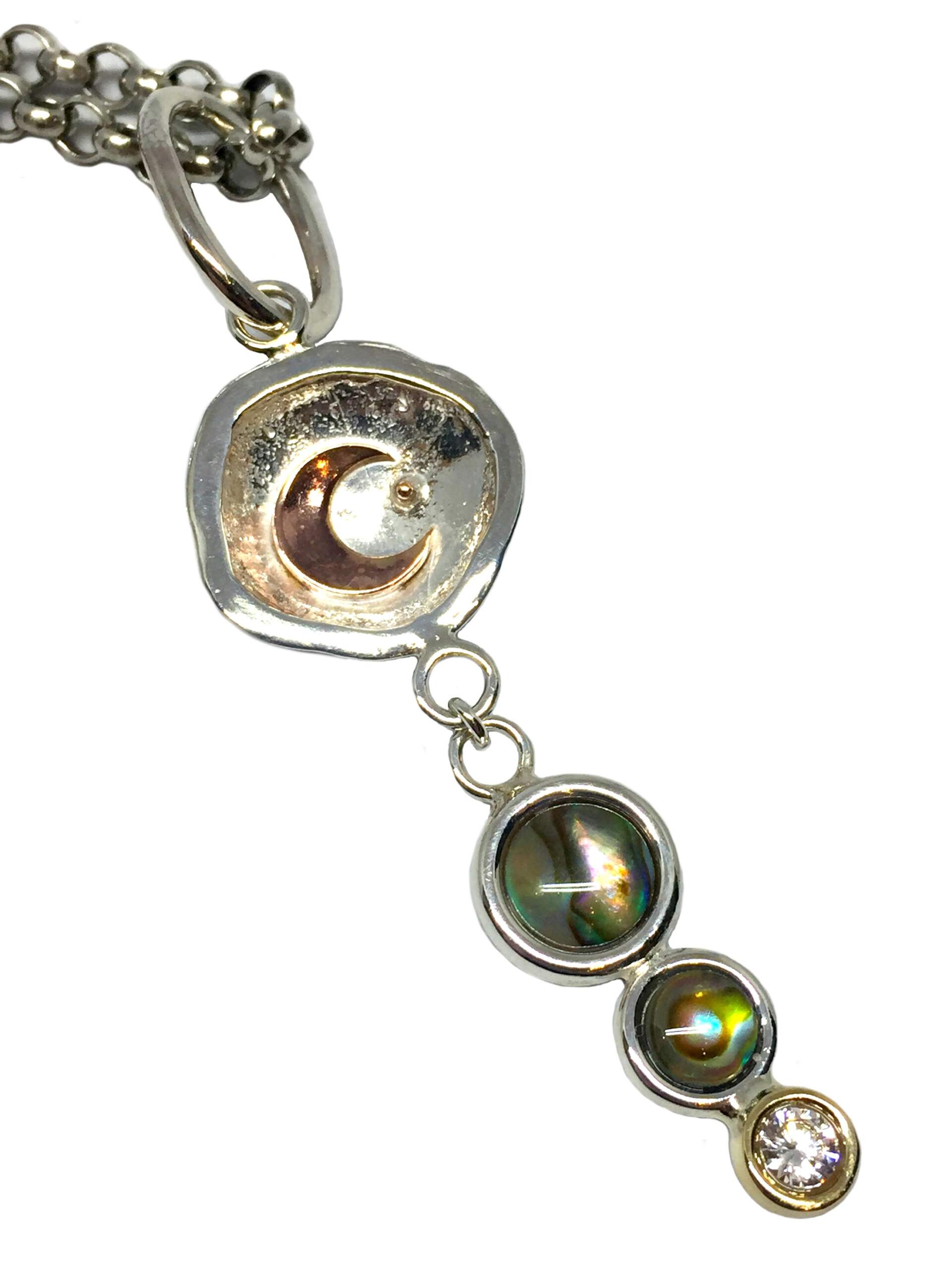Karyn Chopik Silver, Bronze, Pink Bronze, and Abalone Pendant. Chain not included | Effusion Art Gallery + Cast Glass Studio, Invermere BC