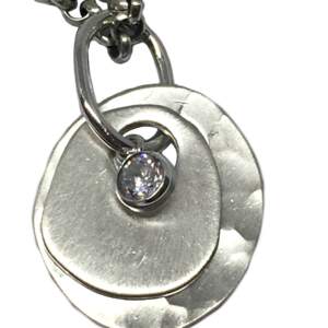Sterling silver, and CZ pendant by Karyn Chopik | Effusion Art Gallery + Cast Glass Studio, Invermere BC