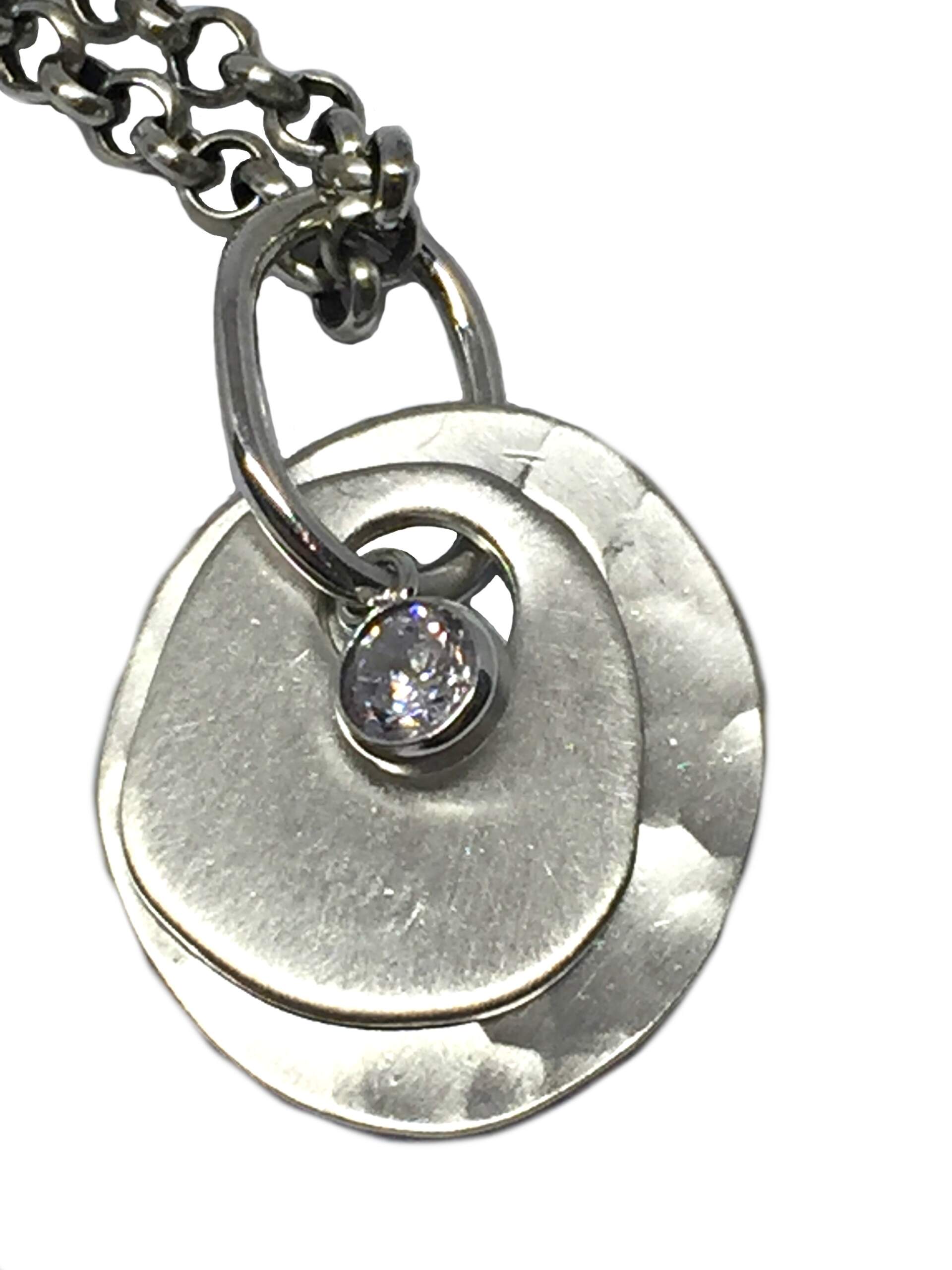 Sterling silver, and CZ pendant by Karyn Chopik | Effusion Art Gallery + Cast Glass Studio, Invermere BC