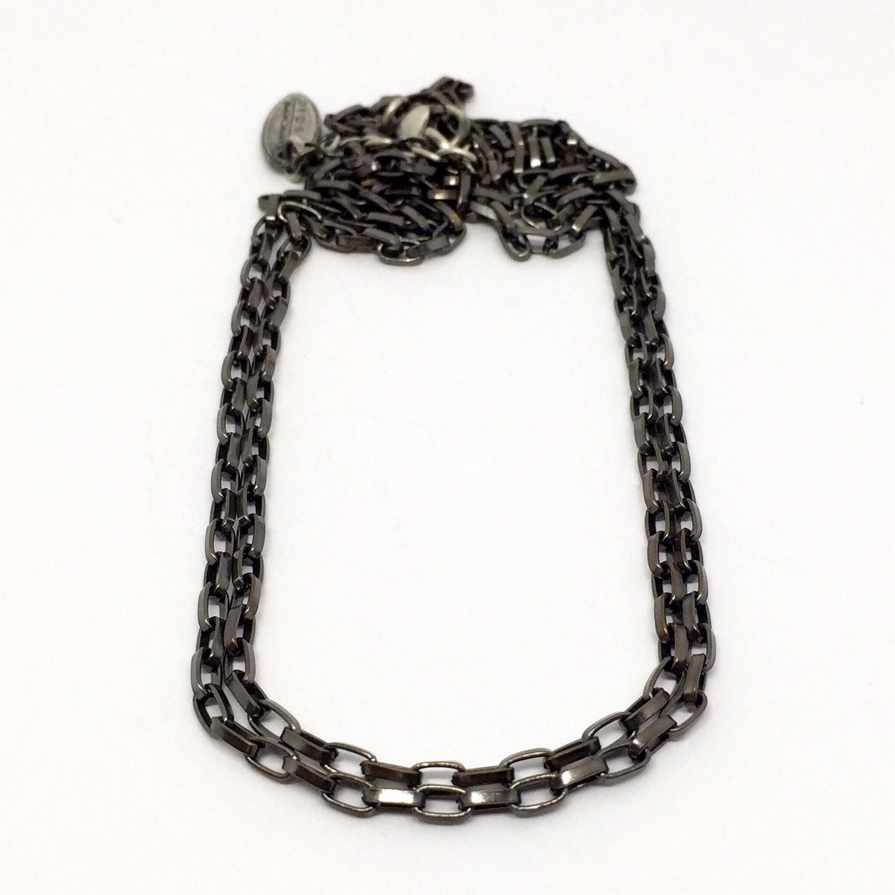 Bronze Karyn Chopik chain | Effusion Art Gallery + cast Glass Studio, Invermere BC