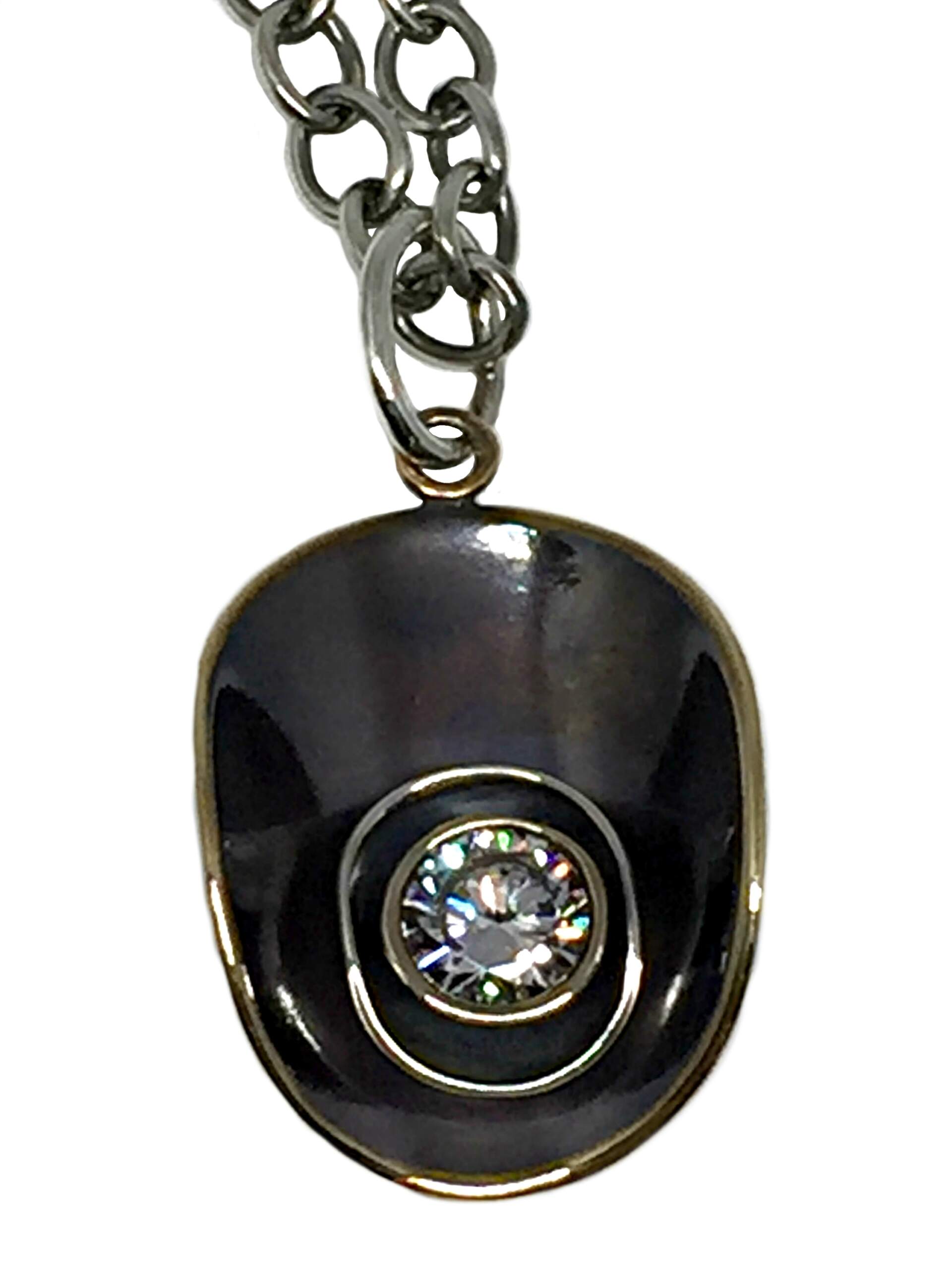 Bronze, Sterling Silver, + CZ Karyn Chopik pendant | Effusion Art Gallery + Cast Glass Studio, Invermere BC