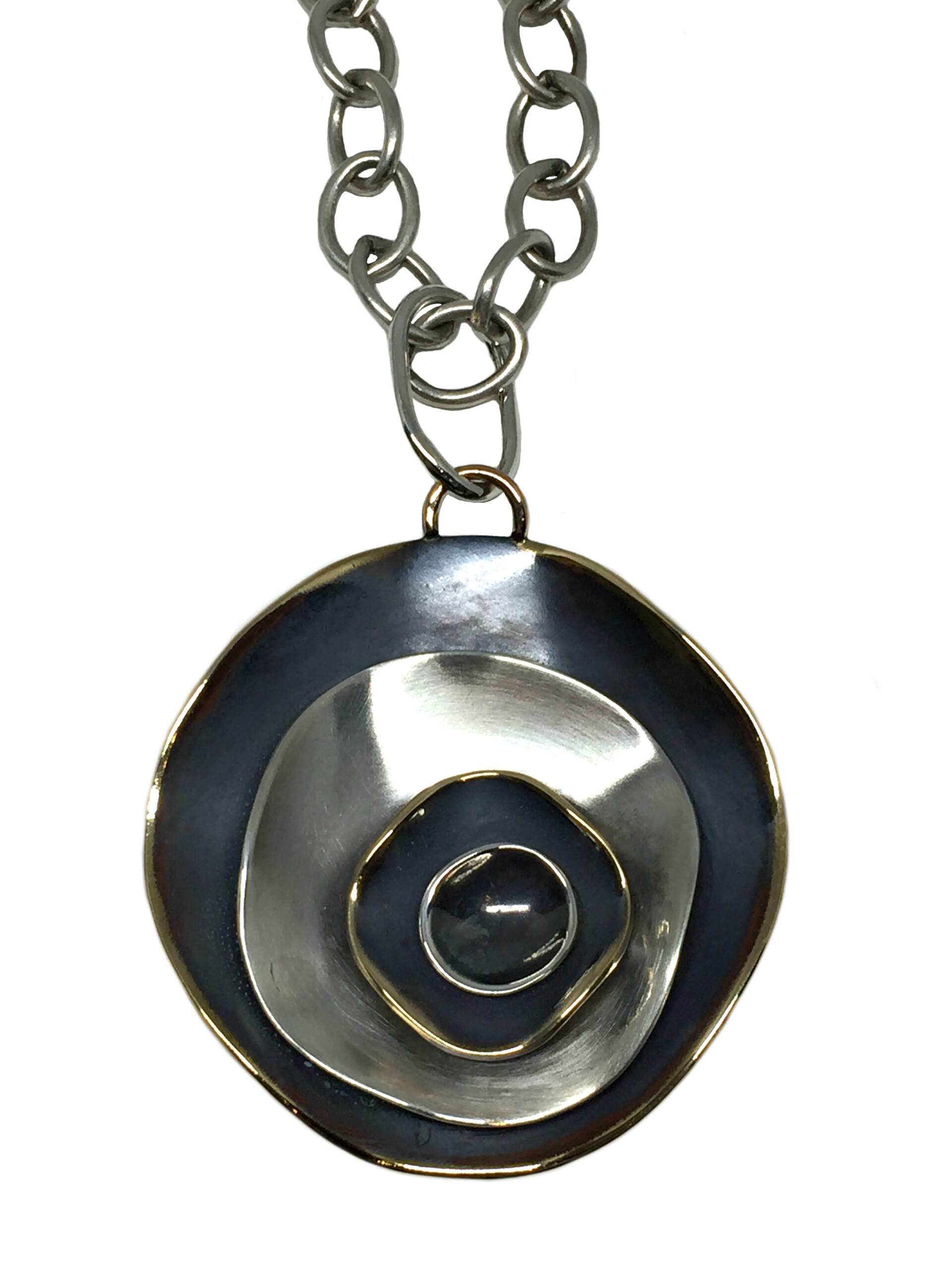 Bronze and sterling silver Karyn Chopik pendant | Effusion Art Gallery + Cast Glass Studio, Invermere BC