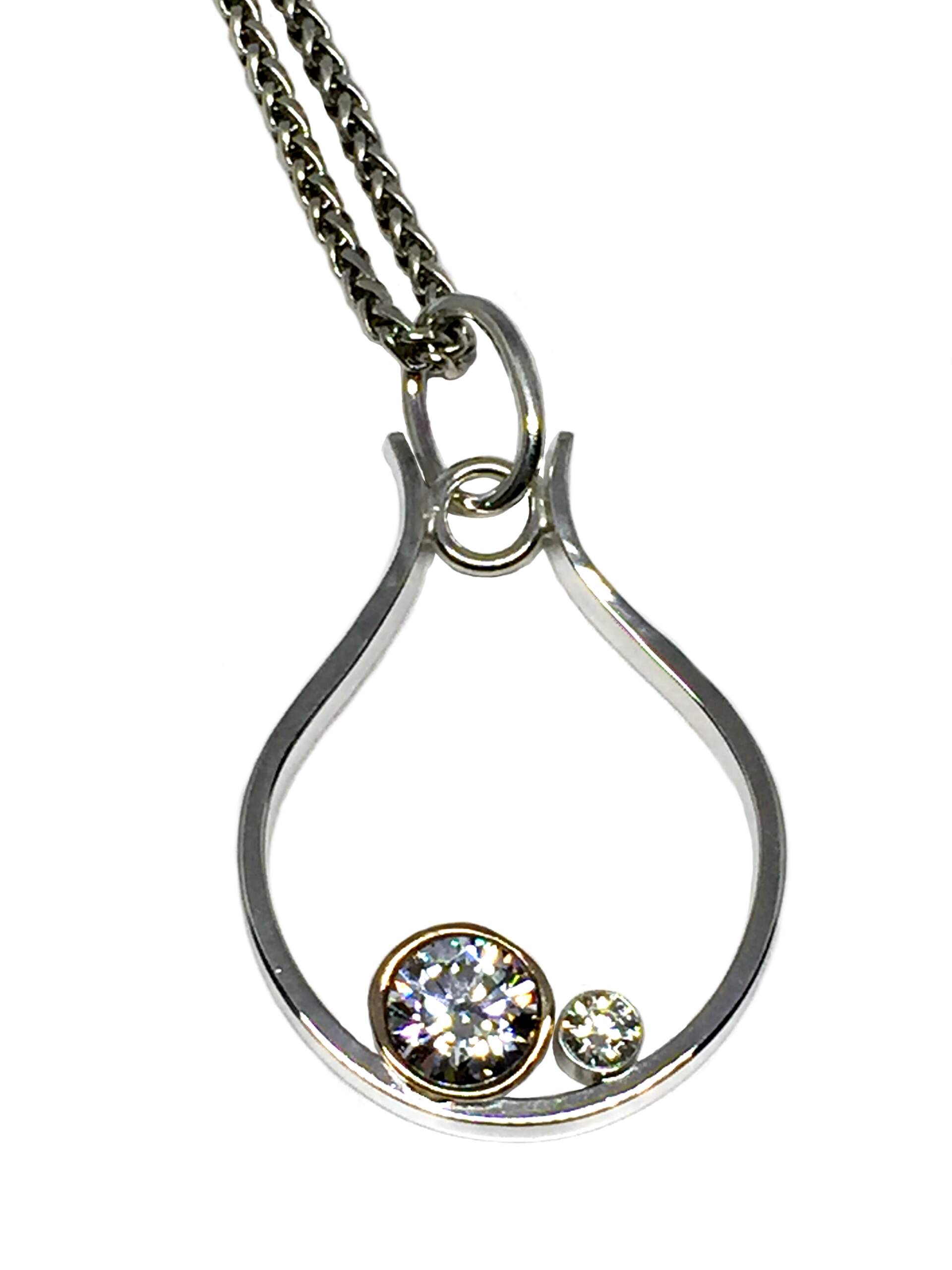 Sterling silver, bronze, + CZ pendant by Karyn Chopik | Effusion Art Gallery + Cast Glass Studio, Invermere BC