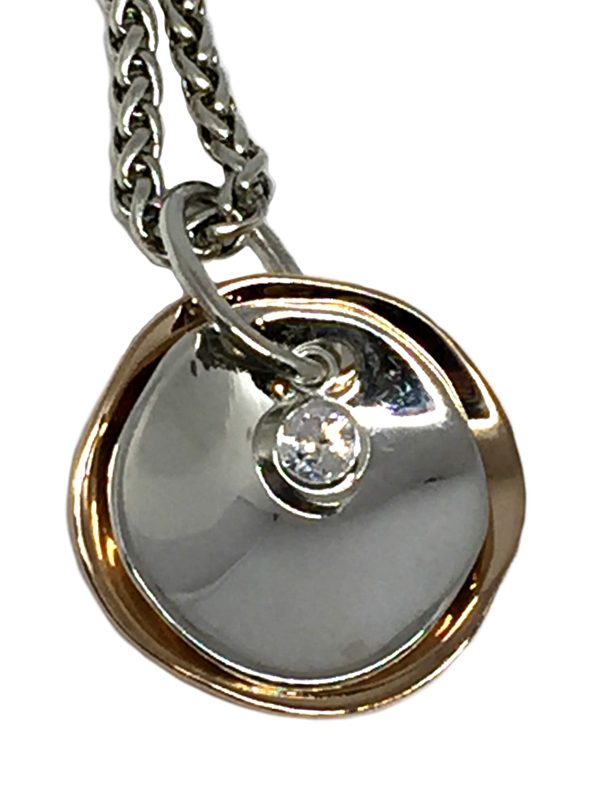 Sterling silver, bronze, + CZ pendant by Karyn Chopik | Effusion Art Gallery + Cast Glass Studio, Invermere BC
