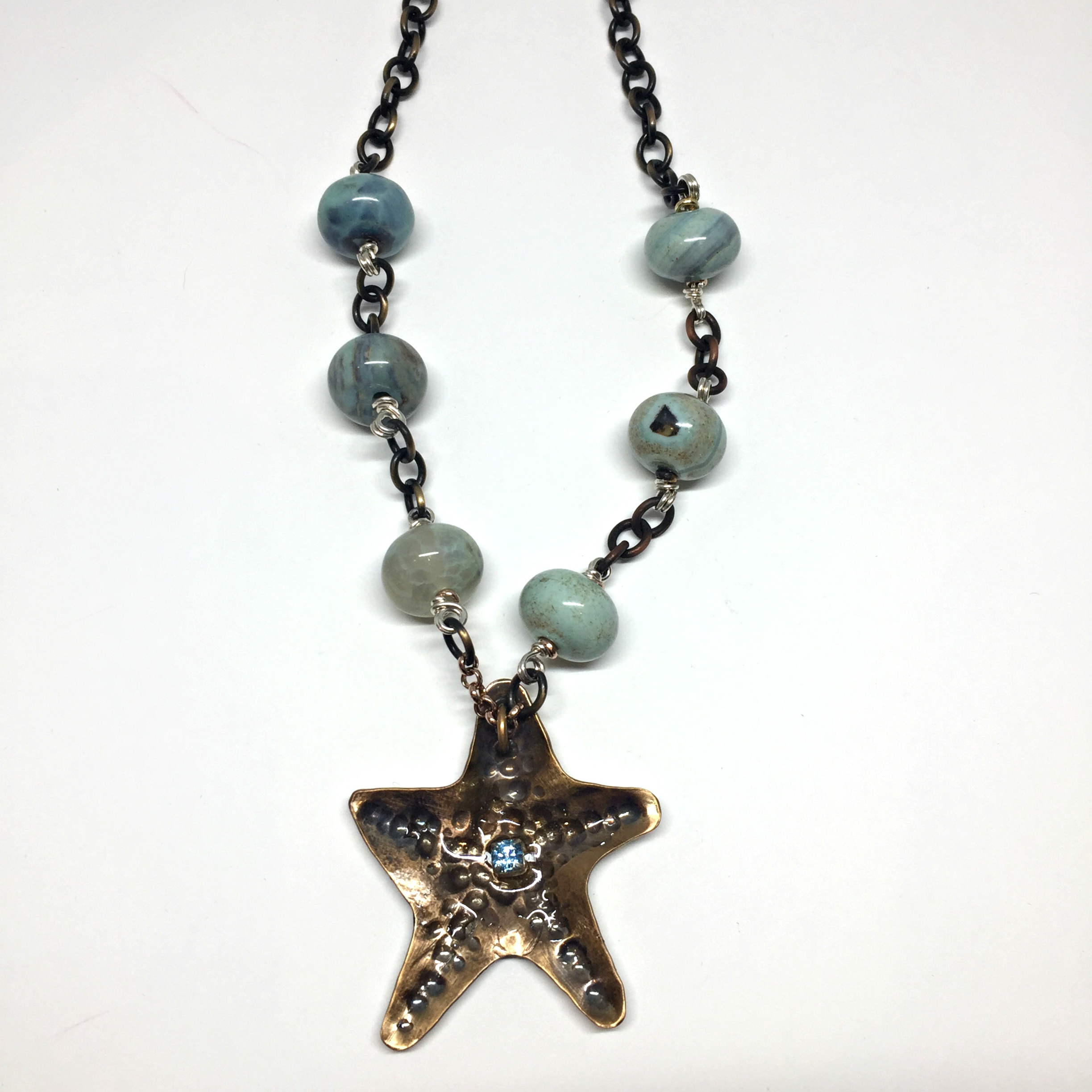 Starfish in Bronze, one of a kind necklace by Karyn Chopik | Effusion Art Gallery + Cast Glass Studio, Invermere BC
