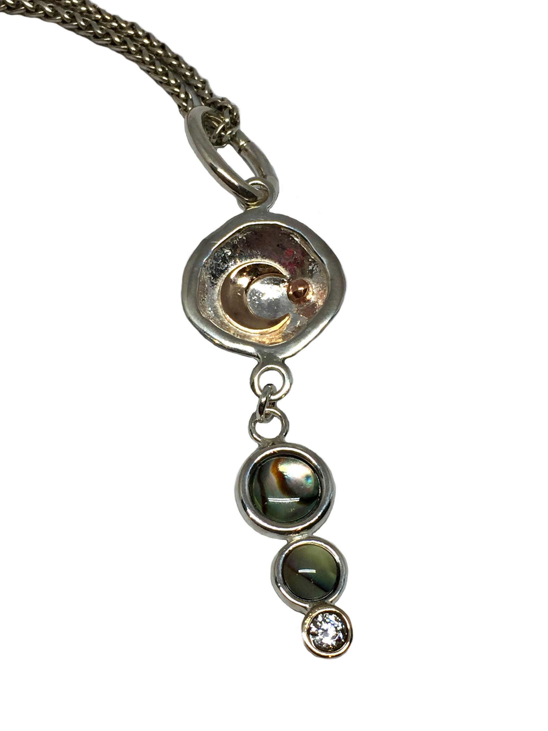 Sterling, bronze, and abalone pendant by Karyn Chopik | Effusion Art gallery + Cast Glass Studio, Invermere BC