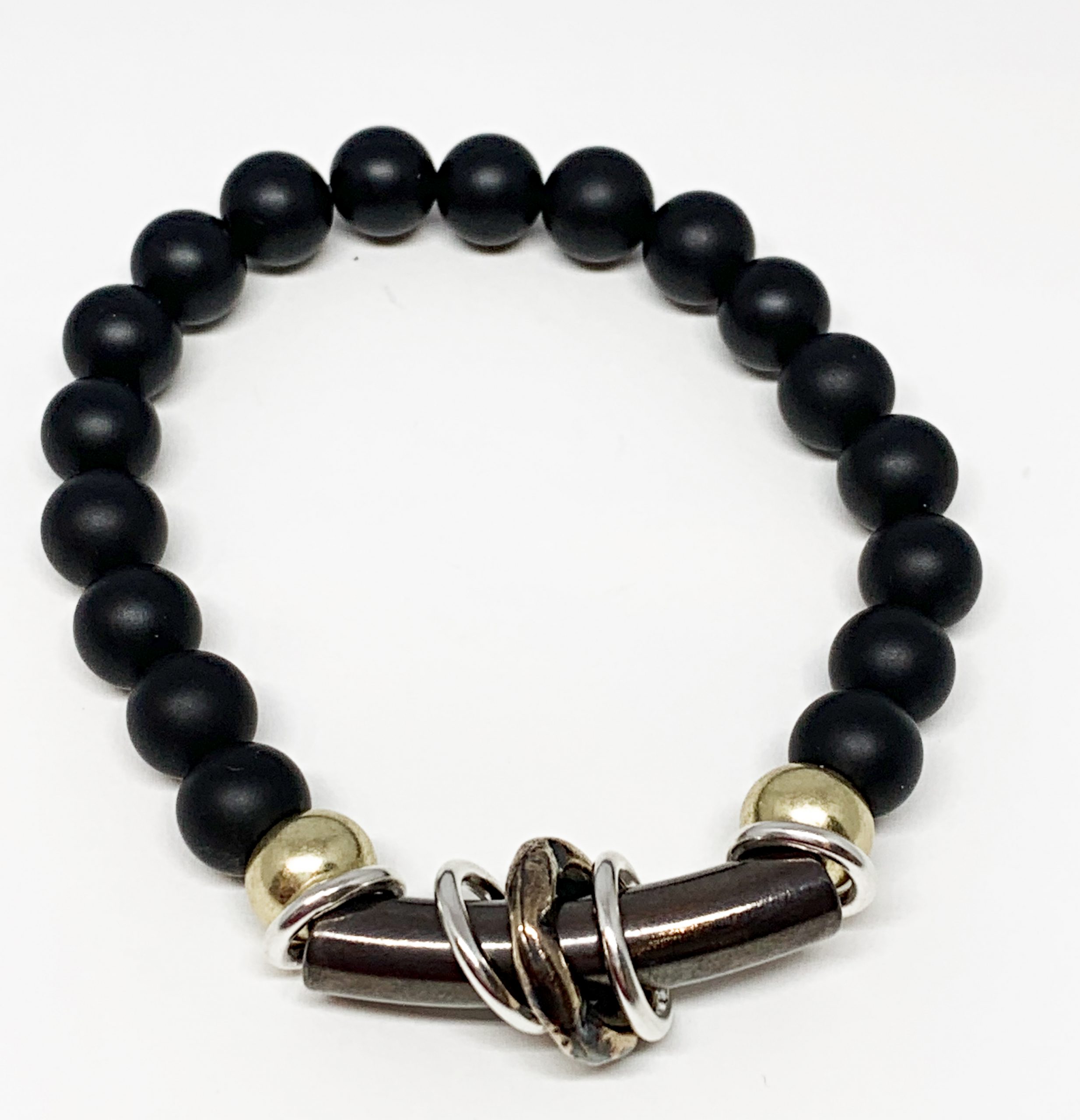 Black onyx, copper, sterling silver, and bronze bracelet by Karyn Chopik | Effusion Art Gallery + Cast Glass Studio, Invermere BC