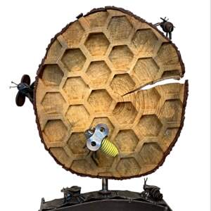 Buzz, salvaged metal and spruce wood bee hive + honeycomb sculpture by Wendy Stone | Effusion Art Gallery + Cast Glass Studio, Invermere BC