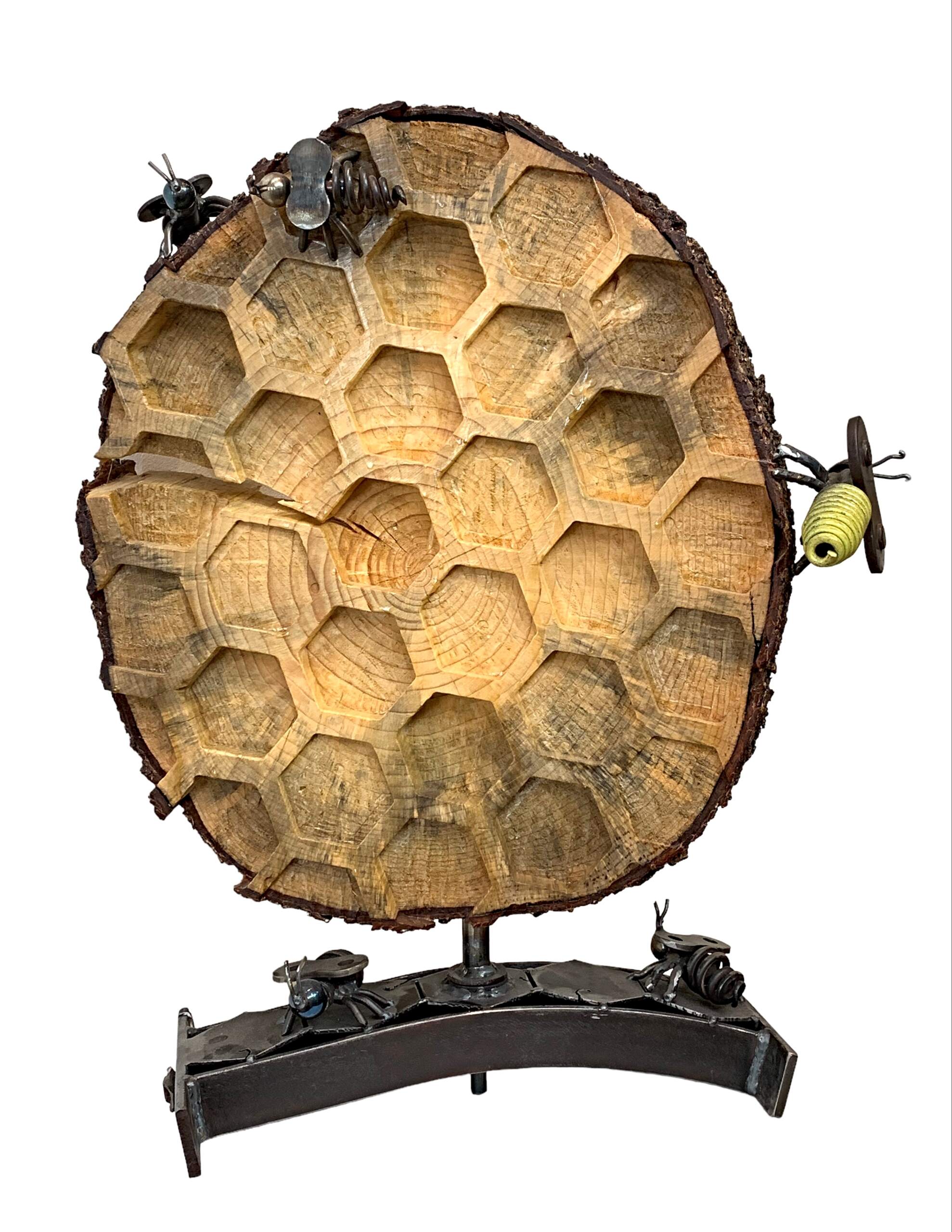 Buzz, salvaged metal and spruce wood bee hive + honeycomb sculpture by Wendy Stone | Effusion Art Gallery + Cast Glass Studio, Invermere BC