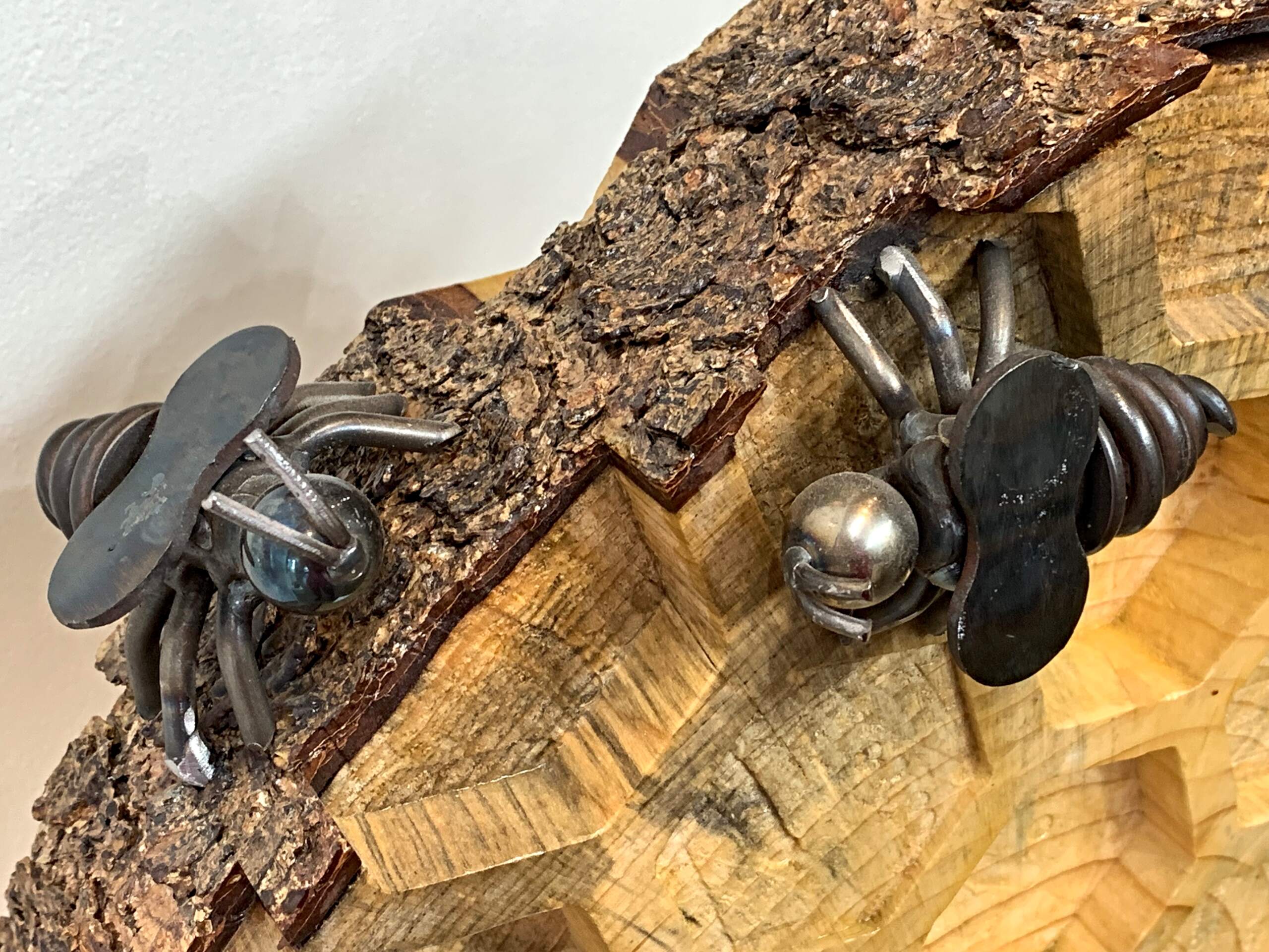 Buzz, salvaged metal and spruce wood bee hive + honeycomb sculpture by Wendy Stone | Effusion Art Gallery + Cast Glass Studio, Invermere BC
