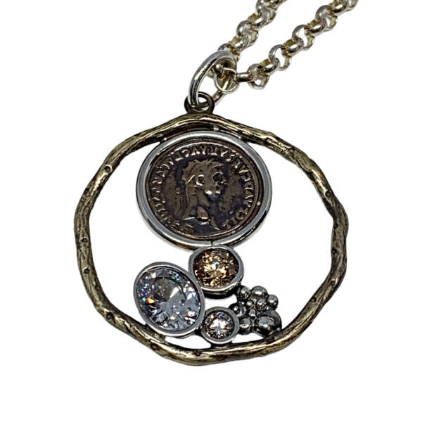 Handmade bronze, sterling silver, + CZ pendant by Karyn Chopik | Effusion Art Gallery + Cast Glass Studio, Invermere BC