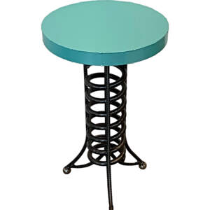 Reclaimed metal side table with a black spiral base and round turquoise top by artist Wendy Stone.