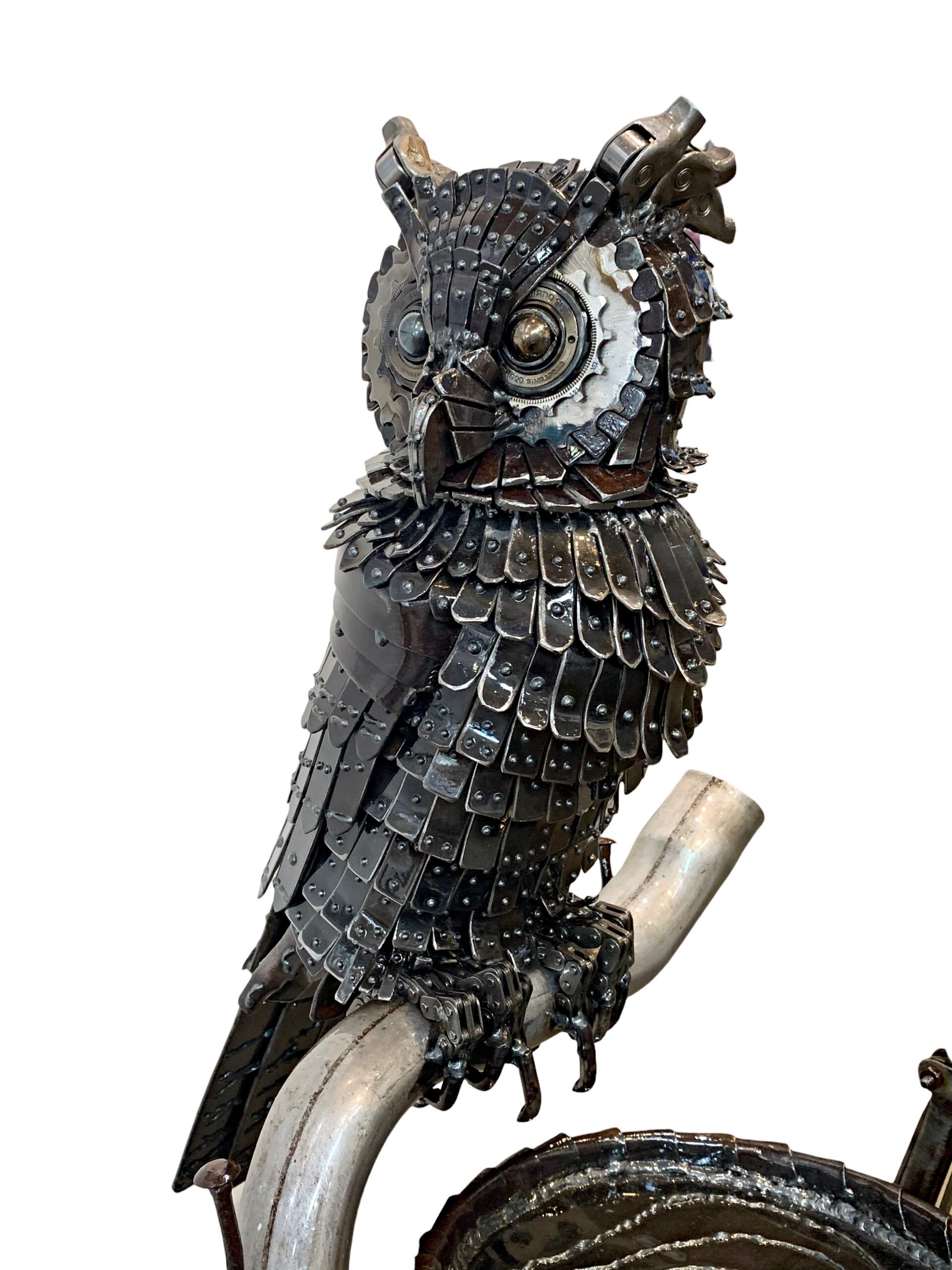 The Midnight Shift, reclaimed steel owl sculpture using Model A and race car parts by Wendy Stone | Effusion Art Gallery, Invermere BC