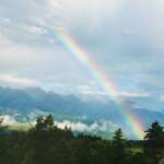 Landscape photo of a rainbow over Lake Windermere by Erin Luyendyk | Effusion Art Gallery, Invermere BC