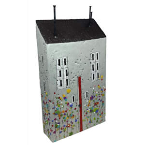 Original encaustic painting of a 3-D grey house with a red door and black roof with abstract flowers by Brenda Walker.