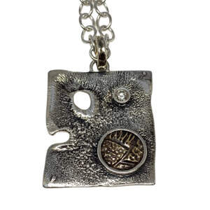 Handmade sterling silver, bronze, + CZ pendant by Karyn Chopik | Effusion Art Gallery, Invermere, BC