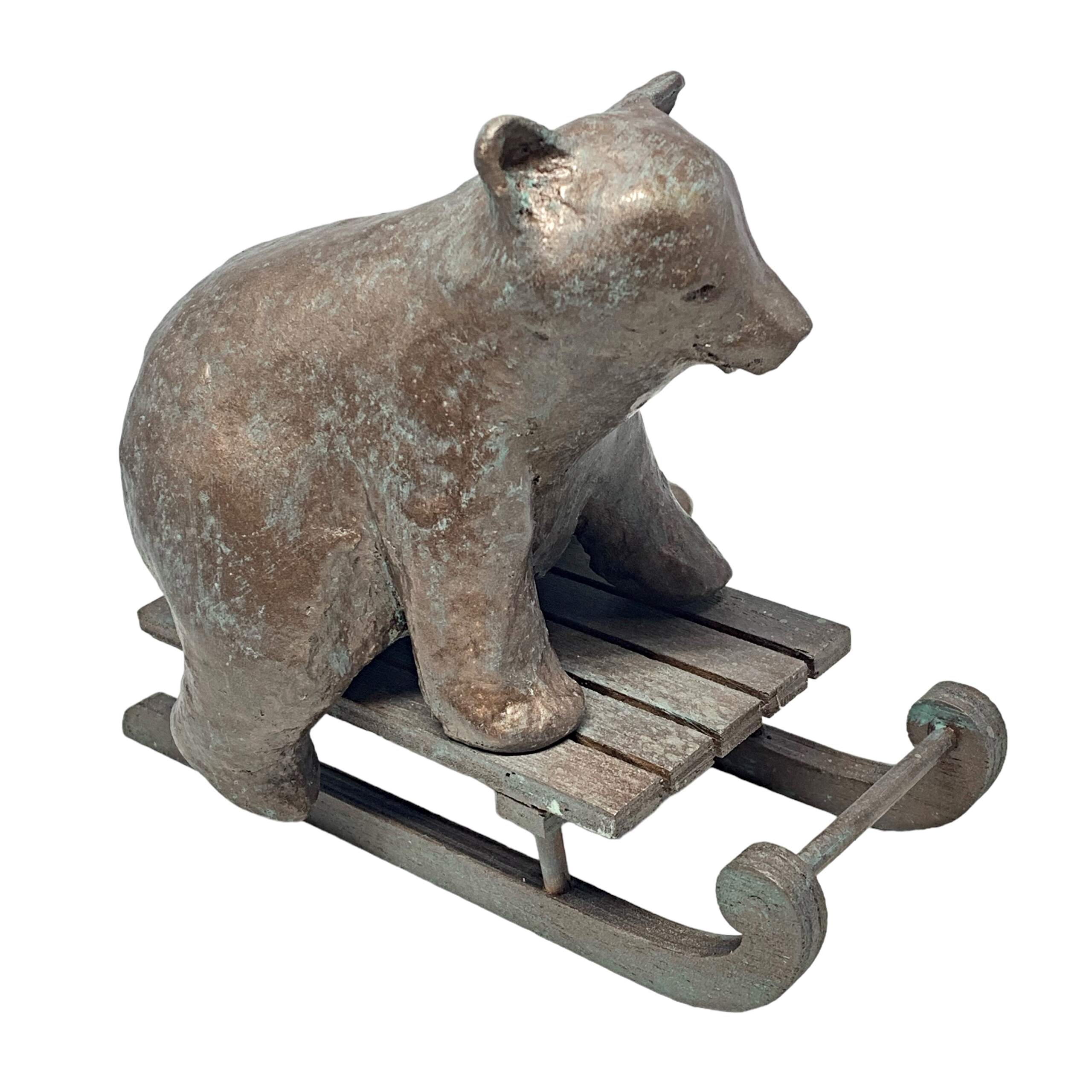 Sleigh Bear, cute mixed media sledding bear sculpture by Karin Taylor at Effusion Art Gallery in Invermere, BC.