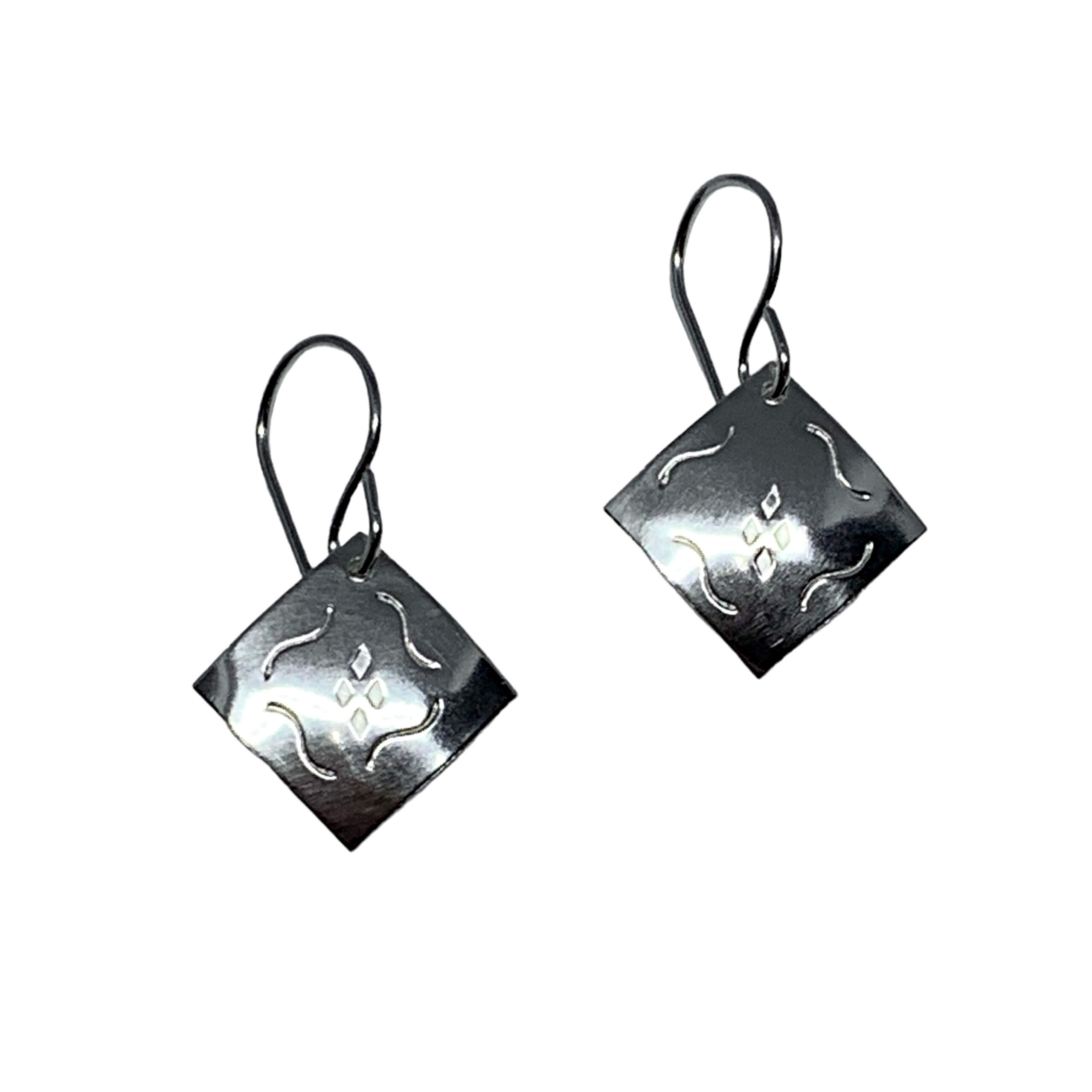 Handmade silver earrings by A&R Jewellery at Effusion Art Gallery in Invermere, BC.