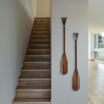 Racing Stripes 1 + 2, one-of-a-kind reclaimed metal canoe paddle wall sculptures by Canadian artist Wendy Stone at Effusion Art Gallery in Invermere, BC.