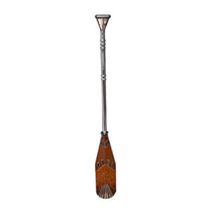 One of a kind reclaimed metal bronze and silver canoe paddle sculpture with a sunday design by Wendy Stone.