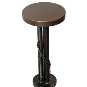 Root Beer Float 1, one-of-a-kind reclaimed steel side table with a satin bronze top by metal artist Wendy Stone at Effusion Art Gallery in Invermere, BC.