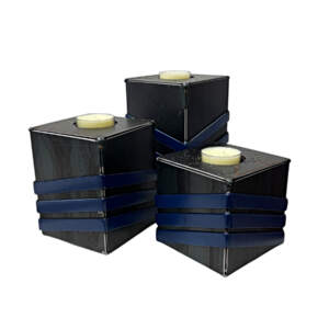 Waterfall, Set of 3 one-of-a-kind reclaimed steel candle holders in navy by metal artist Wendy Stone at Effusion Art Gallery in Invermere, BC.
