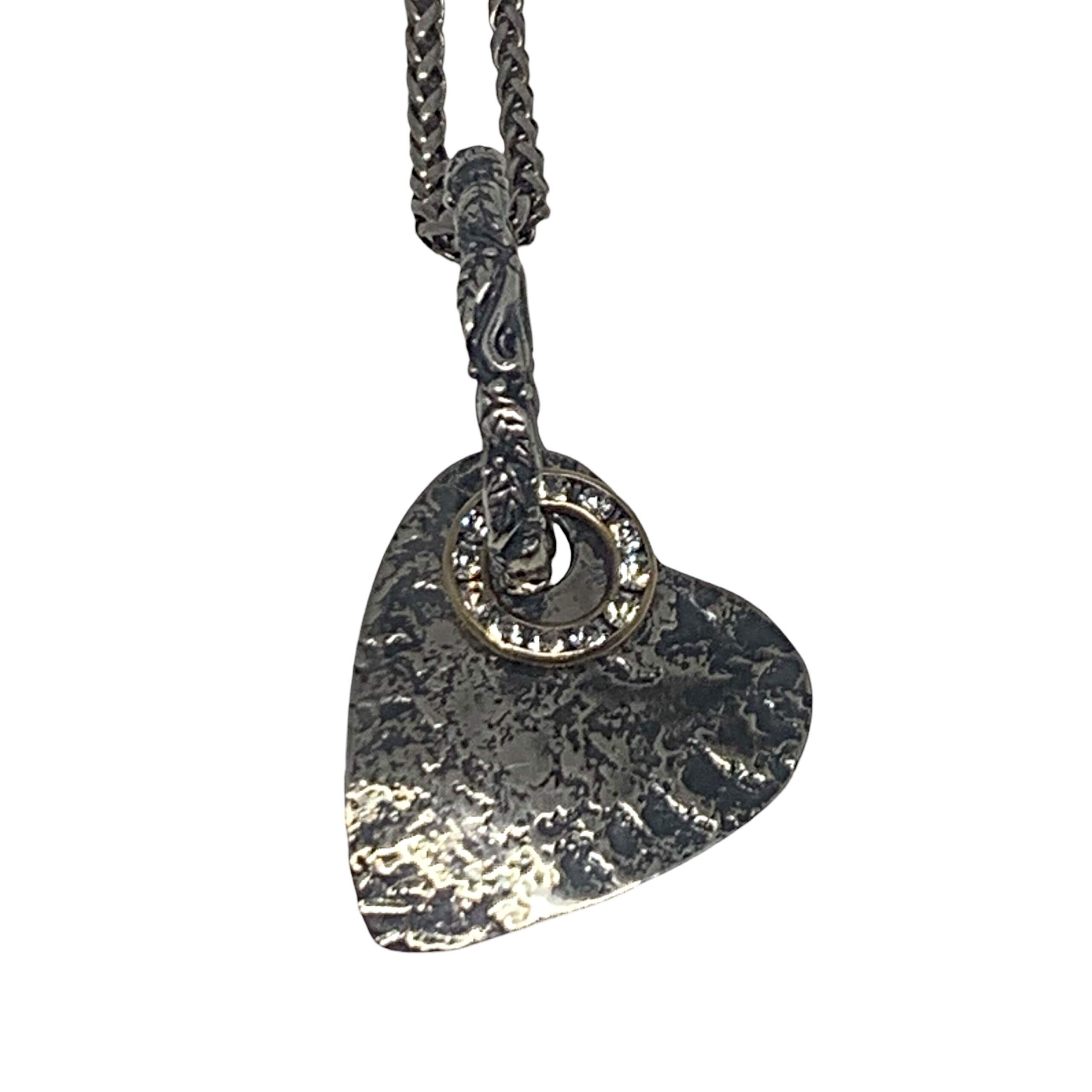 Sterling silver heart pendant by Karyn Chopik at Effusion Art Gallery in Invermere, BC.