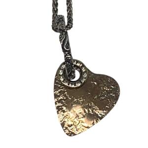 Bronze heart pendant by Karyn Chopik at Effusion Art Gallery in Invermere, BC.