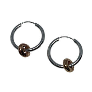 Sterling silver and bronze hoop earrings by Karyn Chopik at Effusion Art Gallery in Invermere, BC.