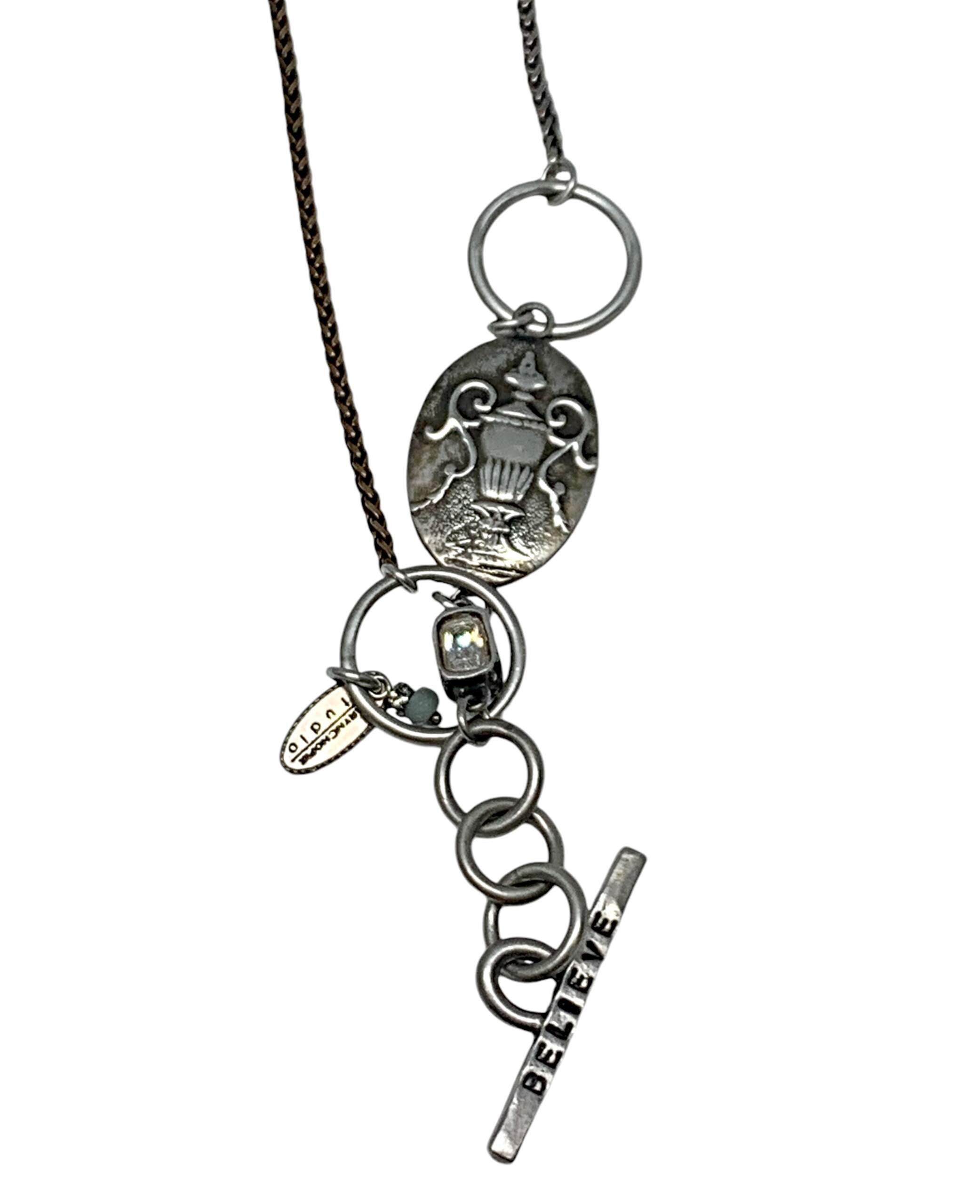 Lamp Lighter Necklace, one of a kind reversible sterling silver + bronze necklace by Karyn Chopik at Effusion Art Gallery in Invermere, BC.