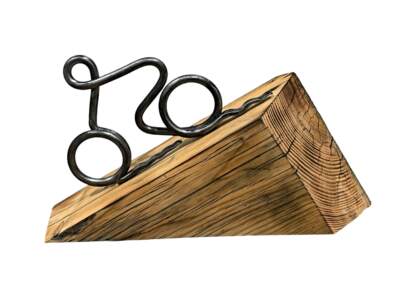 Jumbo Pass, original metal and wooden cyclist sculpture by Canadian metal artist Paul Reimer at Effusion Art Gallery in Invermere, BC.