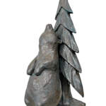 Tree Scratcher, original mixed media sculpture of a friendly bear scratching his back on a tree by Canadian artist Karin Taylor at Effusion Art Gallery in Invermere, BC.
