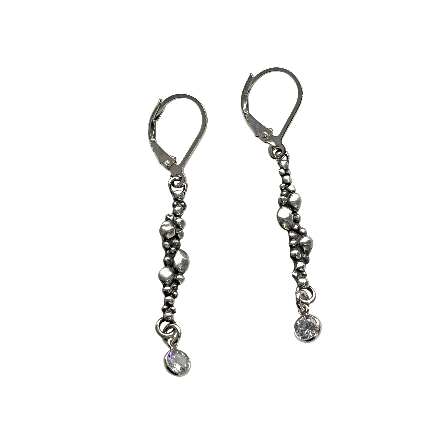 Handmade sterling silver + crystal earrings by Karyn Chopik Jewelry at Effusion Art Gallery in Invermere, BC.