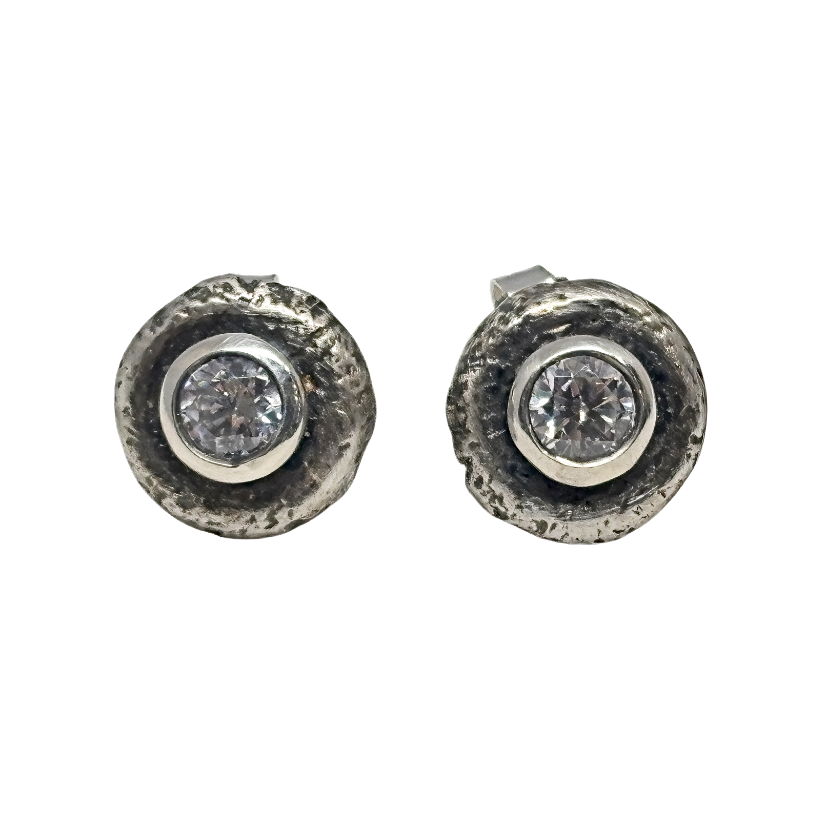 Handmade sterling silver + cubic zirconia stud earrings by Karyn Chopik Jewelry at Effusion Art Gallery in Invermere, BC.