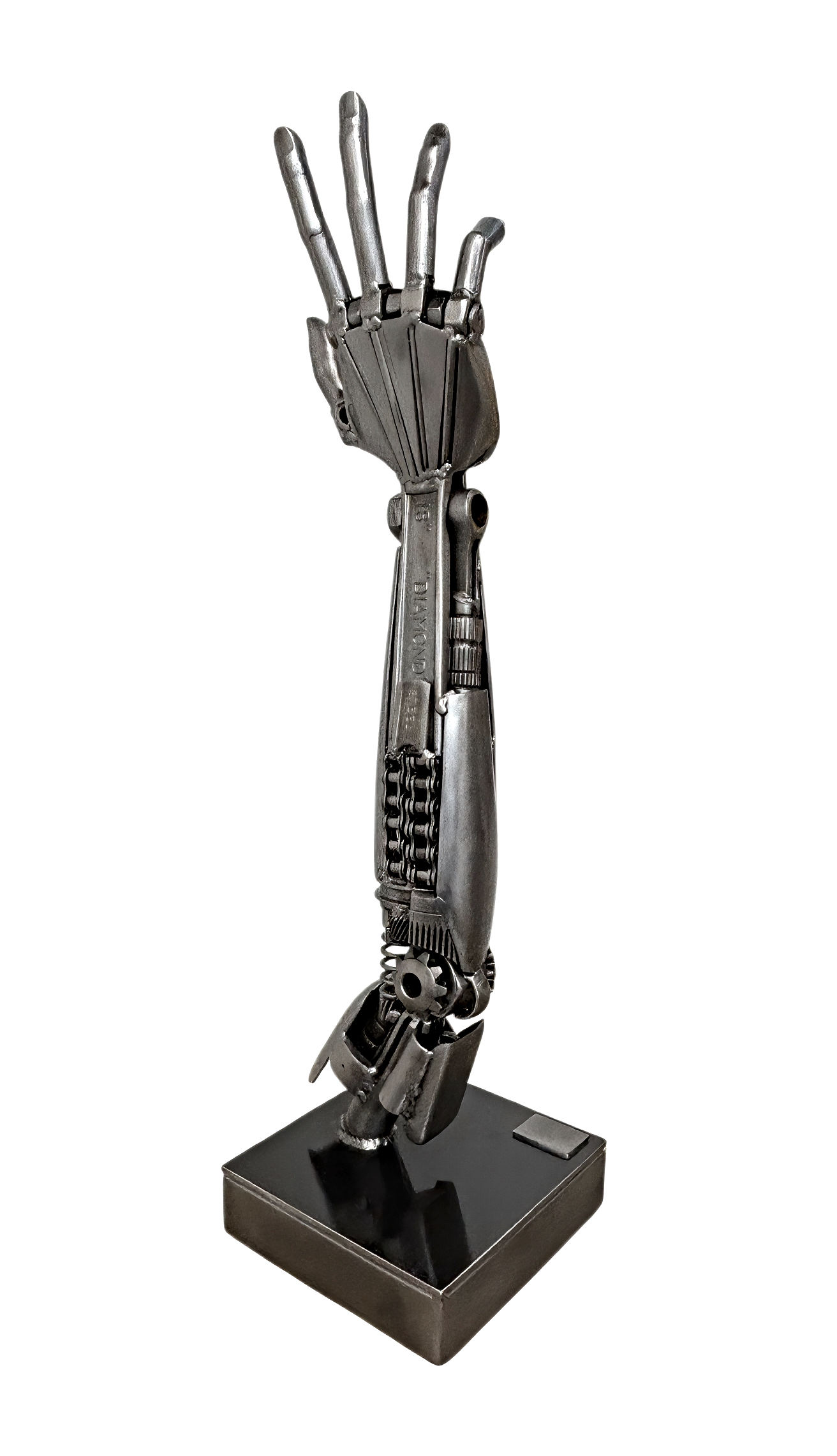 Diamond, original metal robot-inspired arm and hand sculpture by Canadian artist Cory Fuhr at Effusion Art Gallery in Invermere, BC.