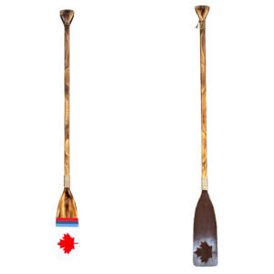 One-of-a-kind hand-painted canoe paddle with maple leaf by Canadian artist Kara Masters at Effusion Art Gallery in Invermere, BC.