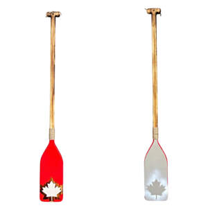 One-of-a-kind hand-painted canoe paddle with maple leaf by Canadian artist Kara Masters at Effusion Art Gallery in Invermere, BC.