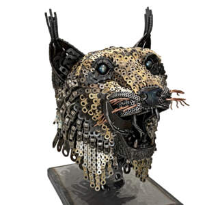 Show Me the Bunny, original reclaimed steel lynx sculpture by Canadian metal artist Wendy Stone at Effusion Art Gallery in Invermere, BC.