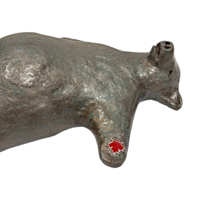 Canadian Savasana Bear, original mixed media sculpture of a friendly bear in the savasana yoga pose with a maple leaf by Canadian artist Karin Taylor at Effusion Art Gallery in Invermere, BC.