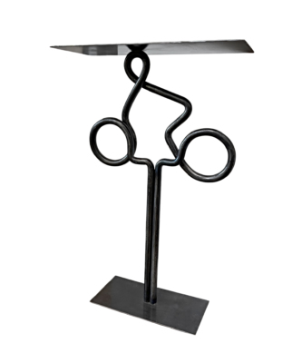 Clear View 1, one-of-a-kind steel cyclist table by Canadian metal artist Paul Reimer at Effusion Art Gallery in Invermere, BC.